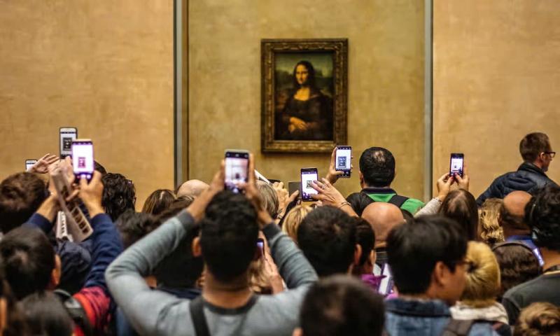 Louvre dong cua dot ngot, dong cua Louvre, bao tang Paris, Mona Lisa, Louvre dinh cong, du lich Paris, khung hoang Louvre, noi tieng qua tai, bieu tuong nuoc Phap, Paris mua he, bao tang qua tai, du khach Paris, tac pham Mona Lisa, phuc hung Louvre, Olympic Paris 2024, mai vom kinh, bao tang noi tieng, kiet tac da Vinci, bao tang xuong cap, canh kho tin Paris anh 3